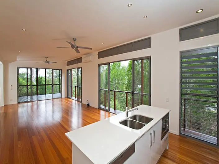 Completed kitchen renovation with new cabinetry and benchtops by Manttan Construction, Brisbane