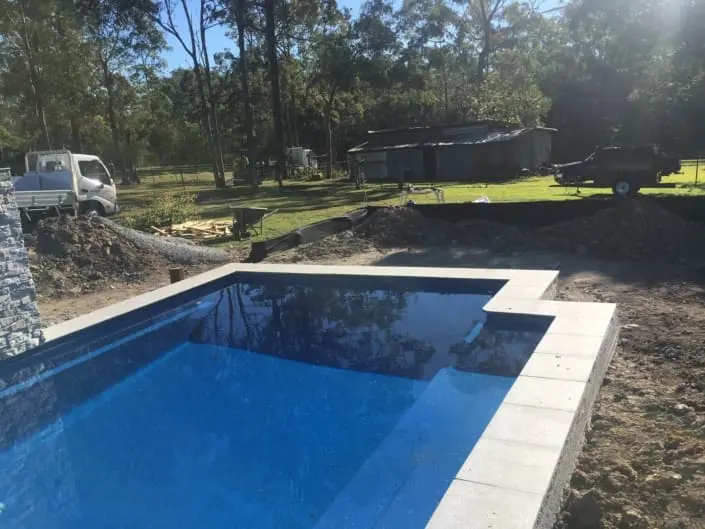 Concrete pool surround and fencing project in Brisbane