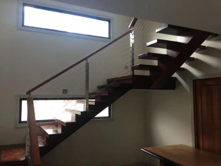 Internal timber staircase installed in a two storey home conversion