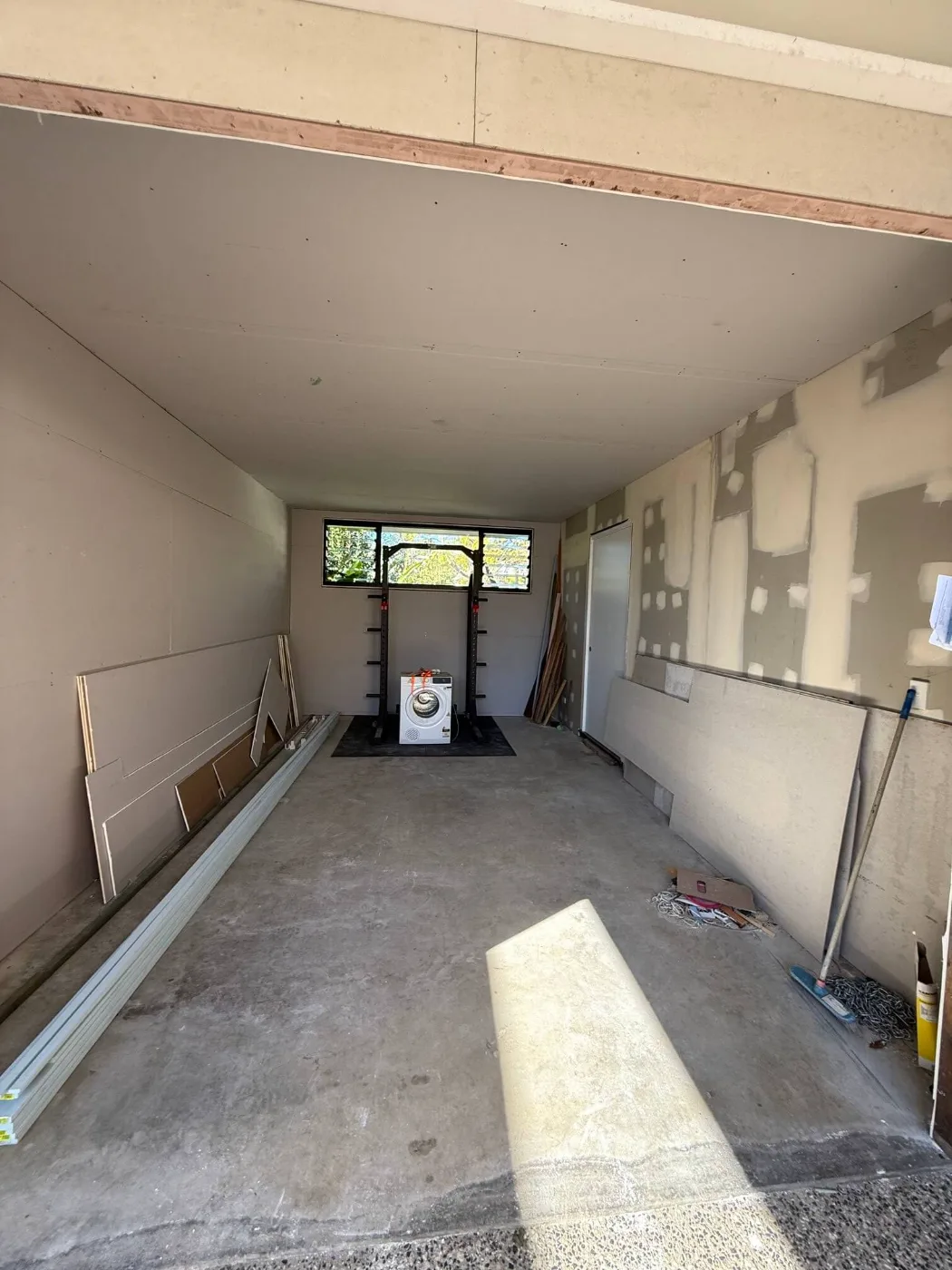 Garage lined with plasterboard during a Brisbane home renovation