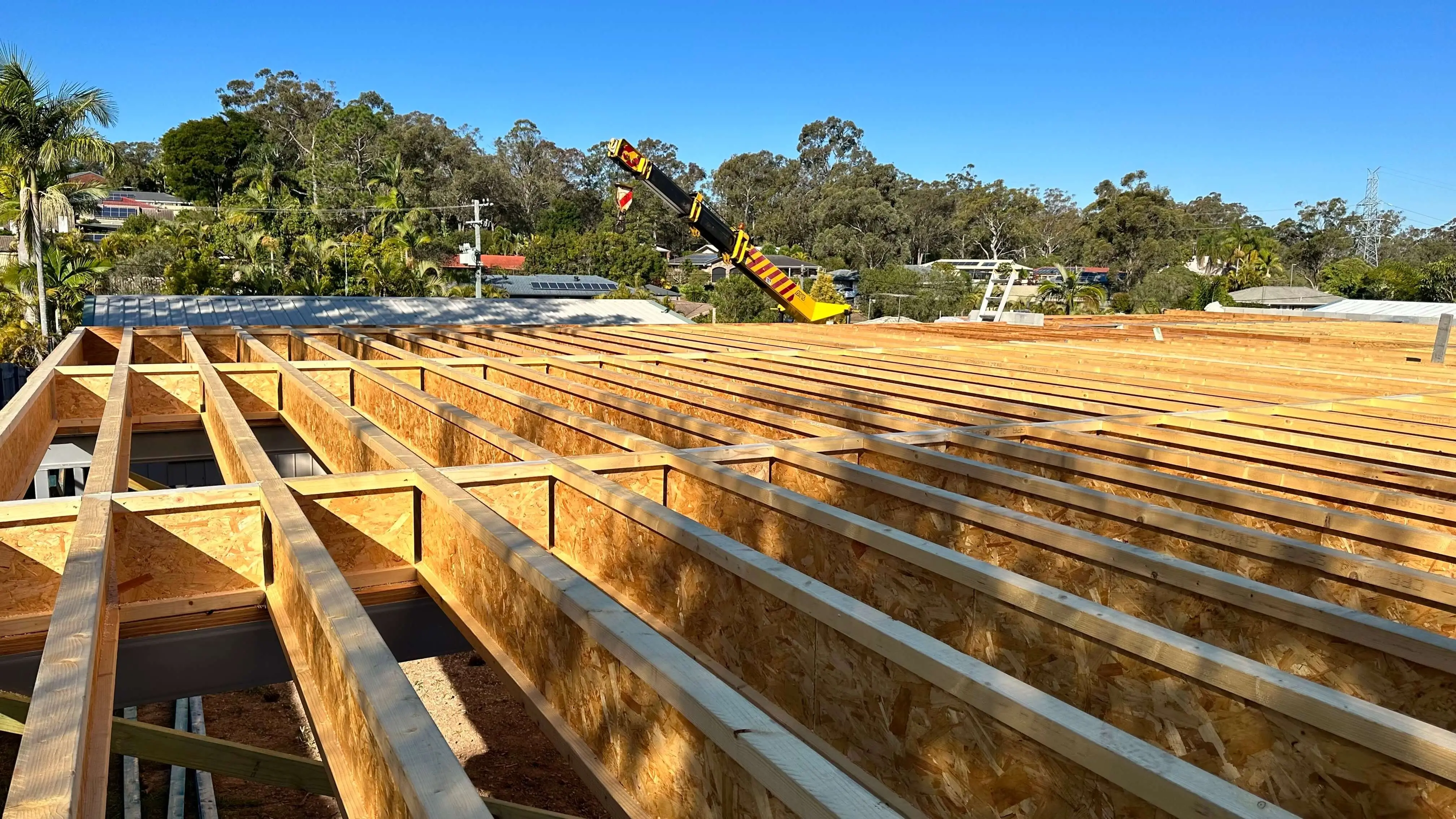 New upper-floor timber joists and framing on a single storey to double storey conversion